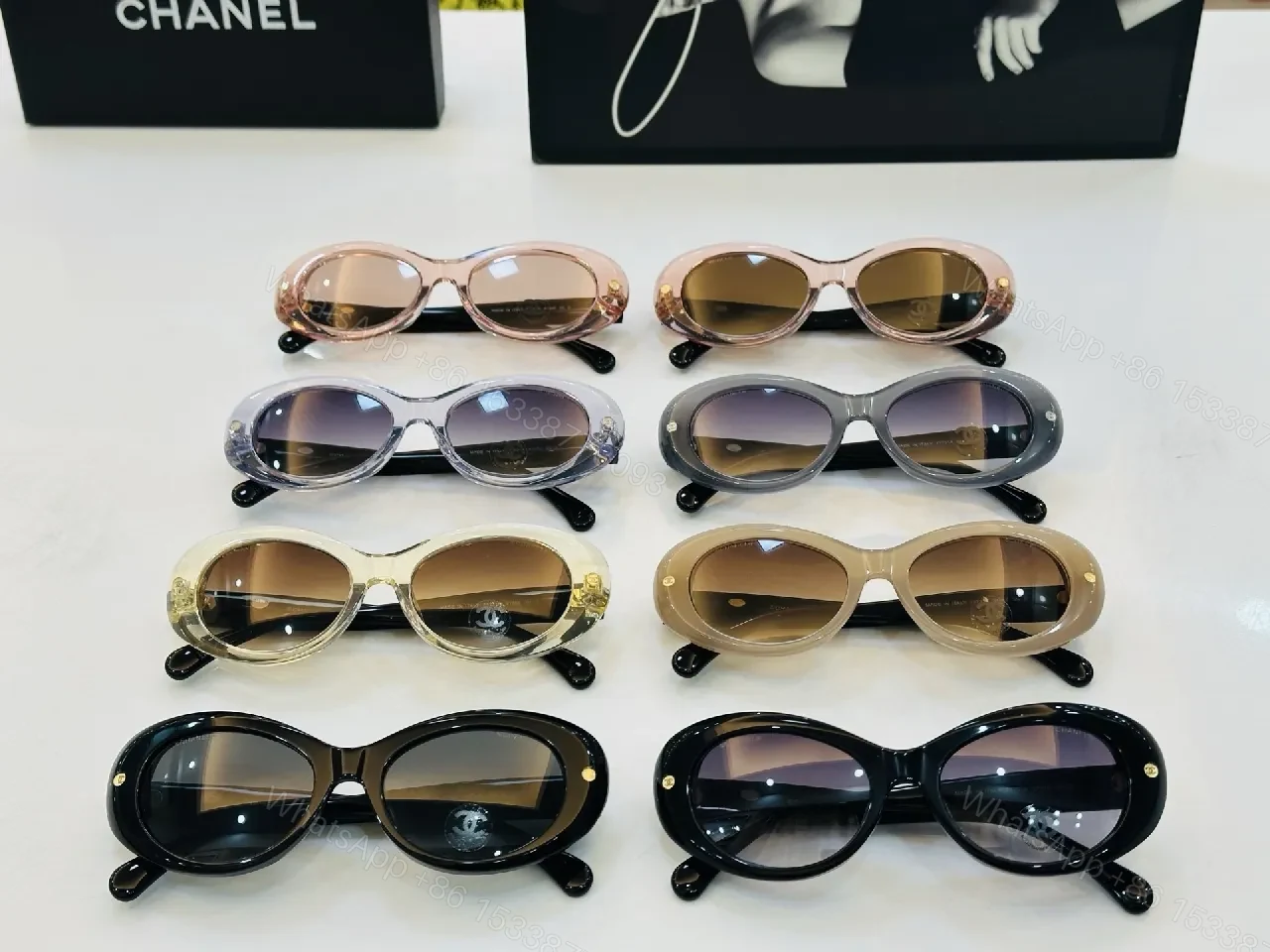 View 2 of Chic Black Cat-Eye Sunglasses with Gold Detailing