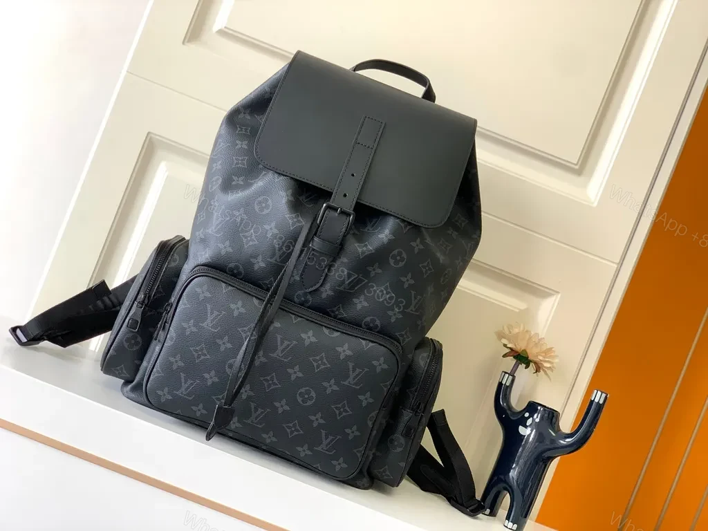 Monogram-Print Leather Backpack: Modern Luxe Utility — view 1