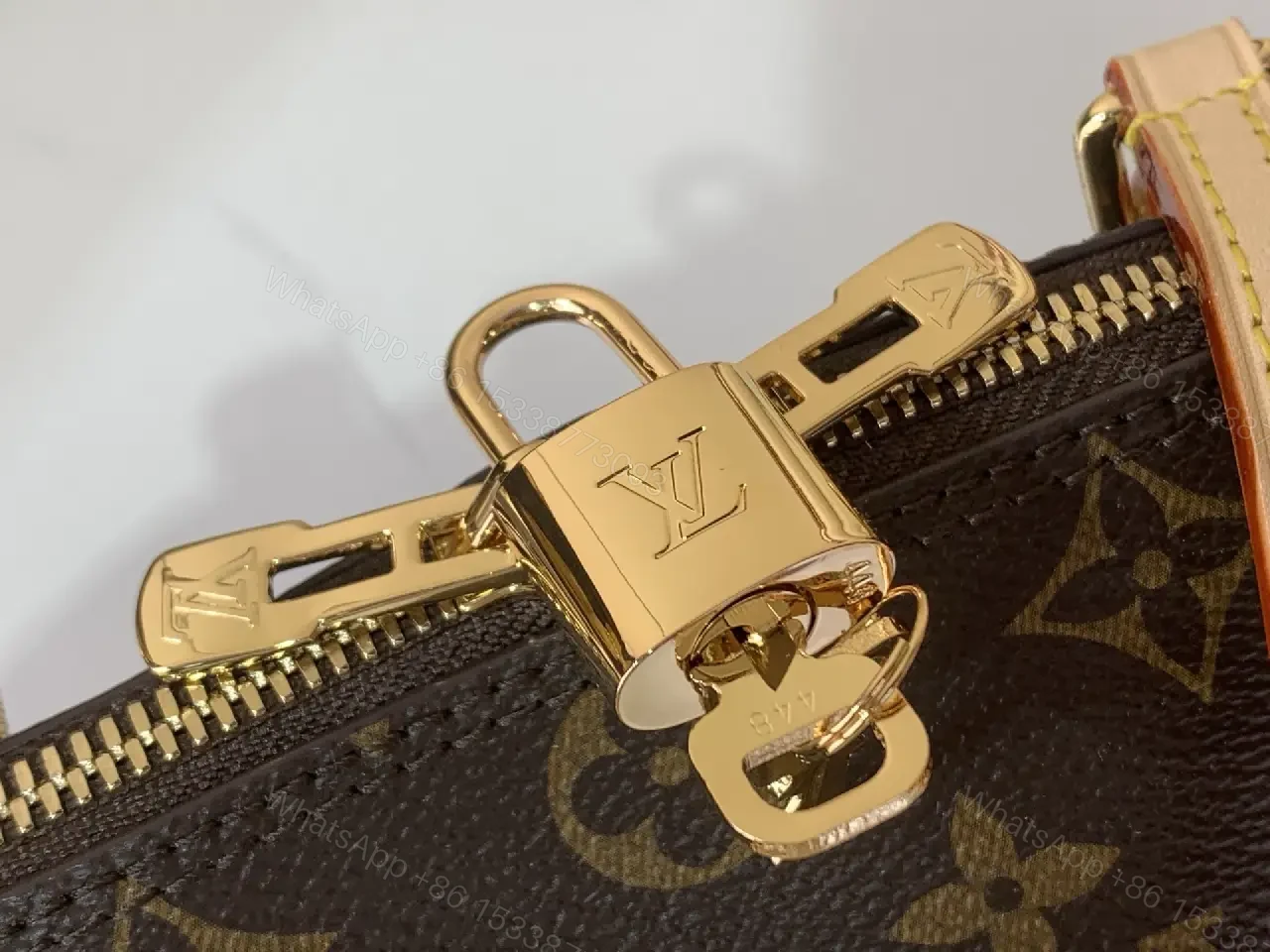 View 3 of Chic Monogram Barrel Bag: Structured, Luxurious Carryall