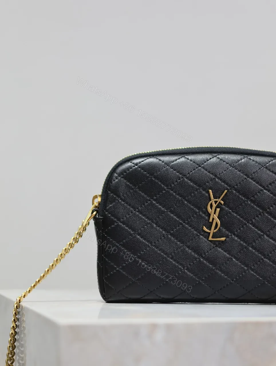 View 2 of Quilted Crossbody Bag with Gold Emblem, Compact Style
