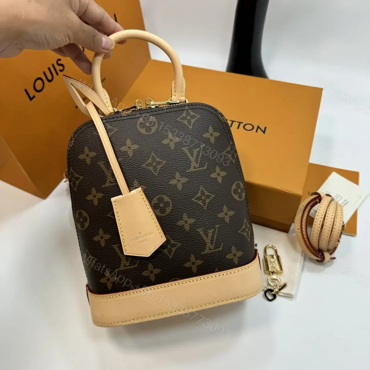 Louis Vuitton Alma backpack in the signature brown monogram canvas — view 1
