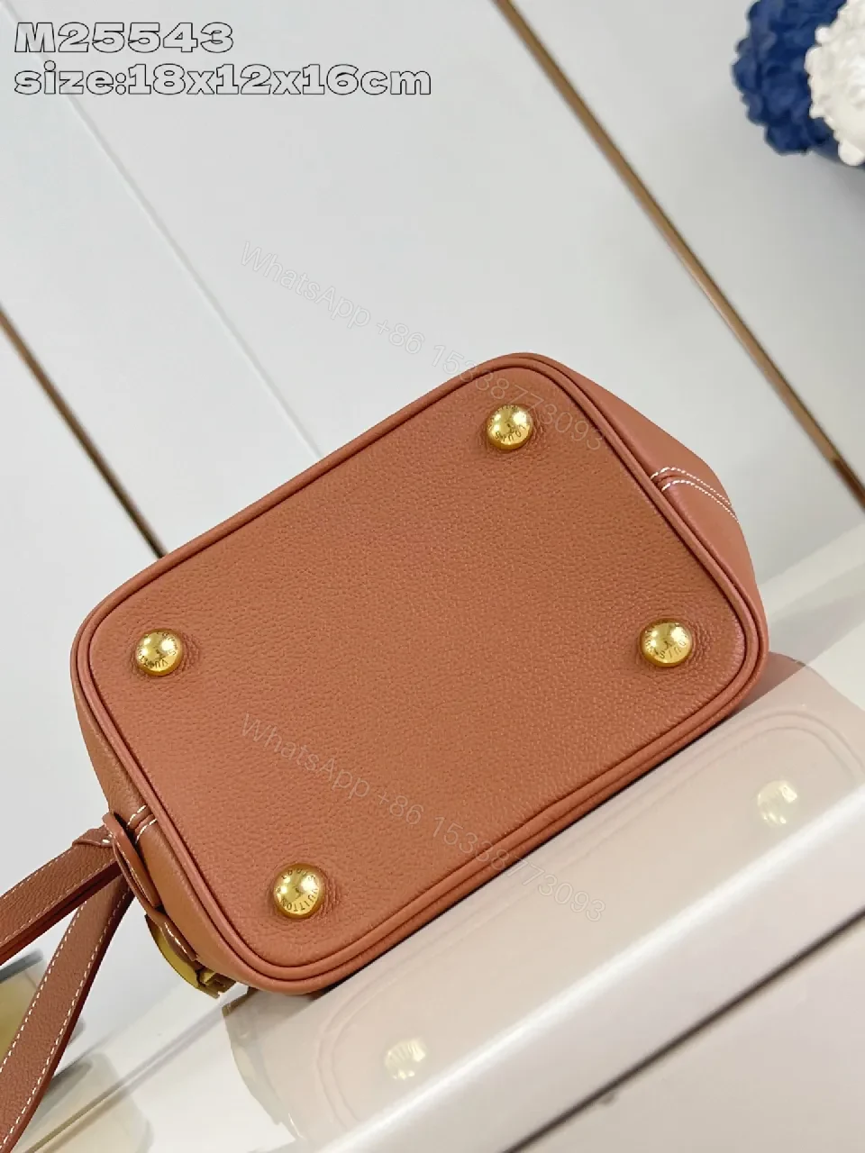 View 2 of Caramel Leather Bucket Bag - Structured, Minimal Hardware, Everyday Luxury