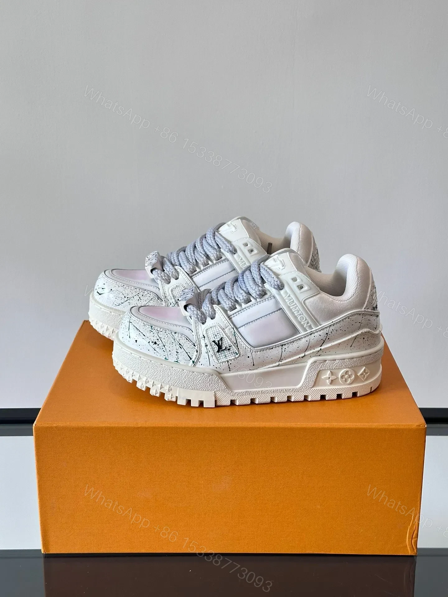 View 3 of LV Men White Leather Sneakers With Black Splatter