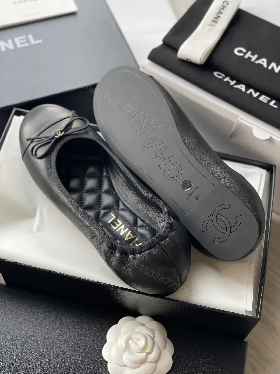 View 3 of Quilted Black Flats with Gold Logo Accents - Chic Comfort