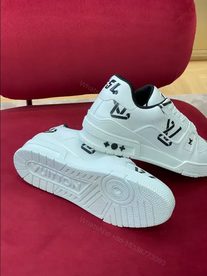 View 7 of LOUIS VUITTON TRAINER LOW-TOP SNEAKERS IN WHITE AND BLACK – LSVT389
