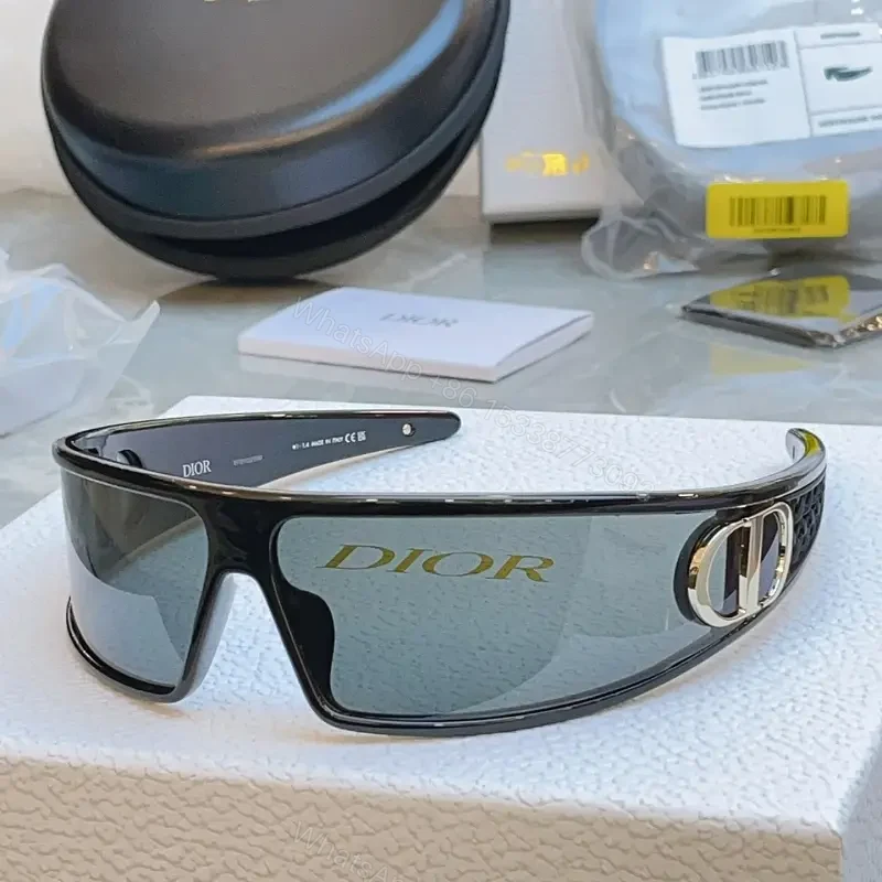 Black Frame Sunglasses: Futuristic Wraparound, Dior Gold Logo Lenses — view 1