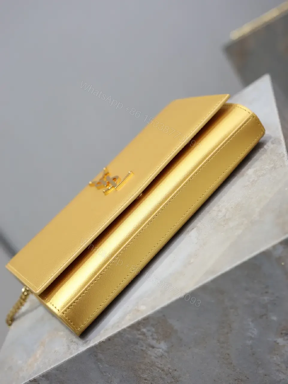 View 6 of Gold-Tone Leather Clutch Wallet with YSL Hardware