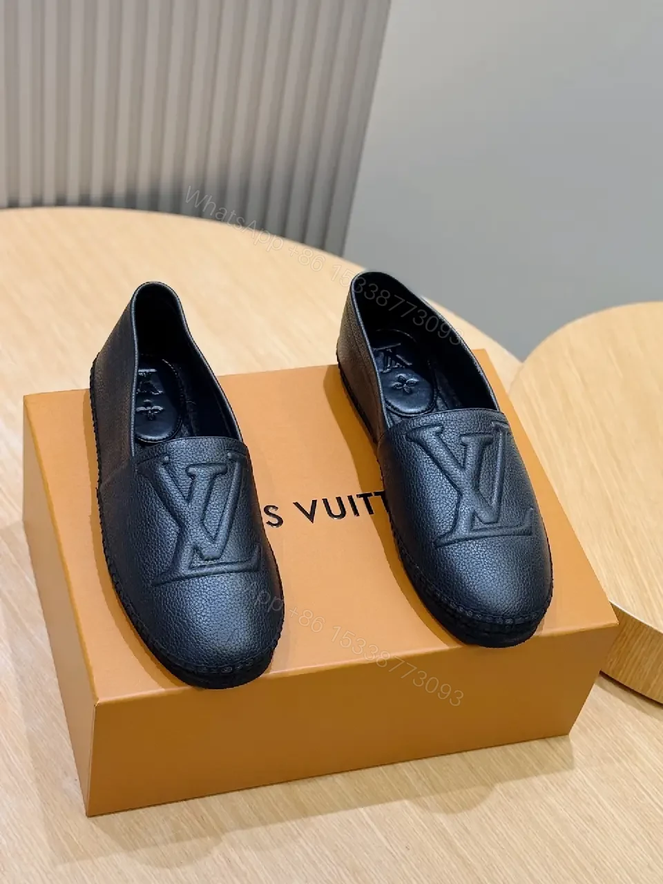 View 10 of Textured Leather Loafers: Subtle Monogram, Modern Comfort
