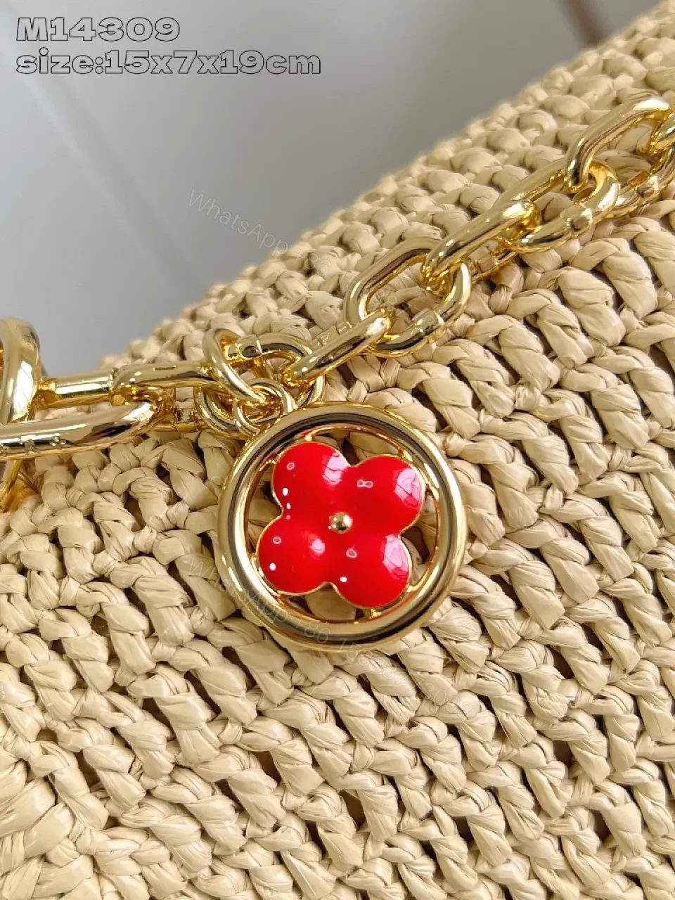 View 2 of Elegant Woven Straw Shoulder Bag with Gold Hardware