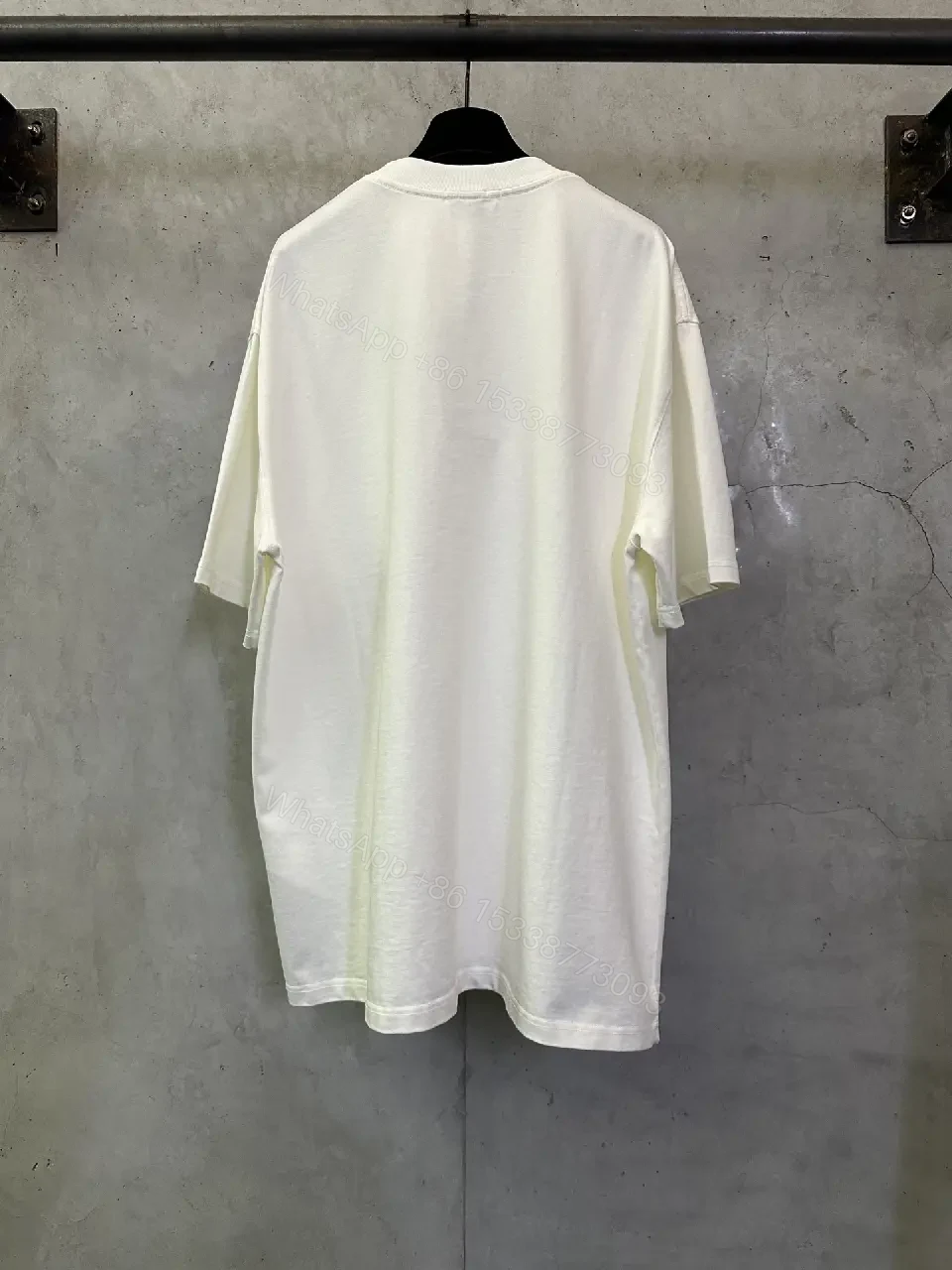 View 11 of Bold Logo Tee: Minimalist Comfort, Black Graphic White Tee