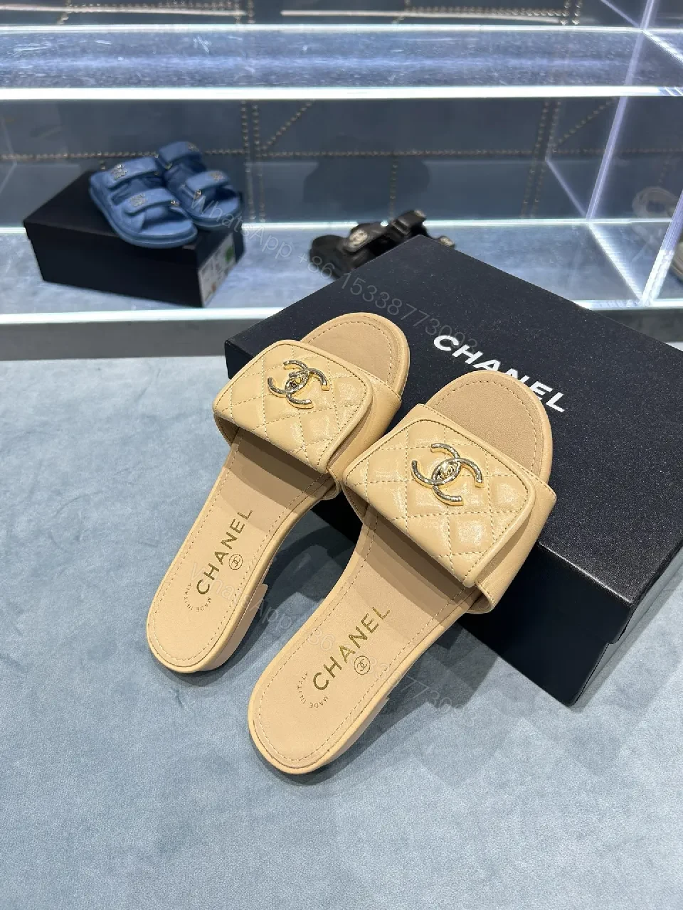 View 3 of Beige Quilted Leather Slide Sandals with Logo Detailing