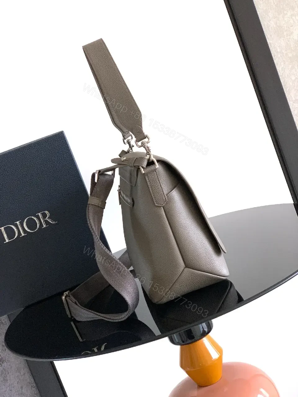 View 8 of Pebble Leather Crossbody: Subtle Branding, Quiet Luxury
