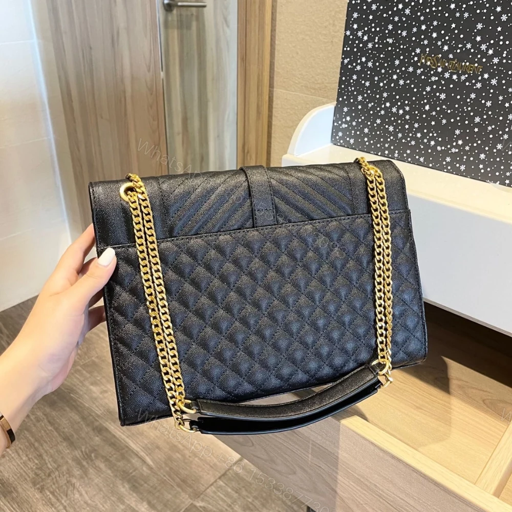 View 4 of Saint Laurent Envelope Large In Quilted Grain De Poudre Embossed Black Gold 31Cm 600166BOW911000
