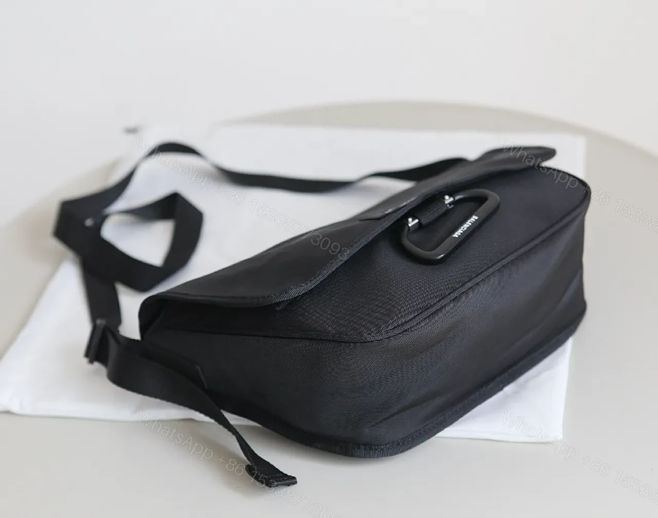 View 9 of Black Durable Matte Nylon Messenger Bag – Compact, Adjustable Strap, Minimalist Style