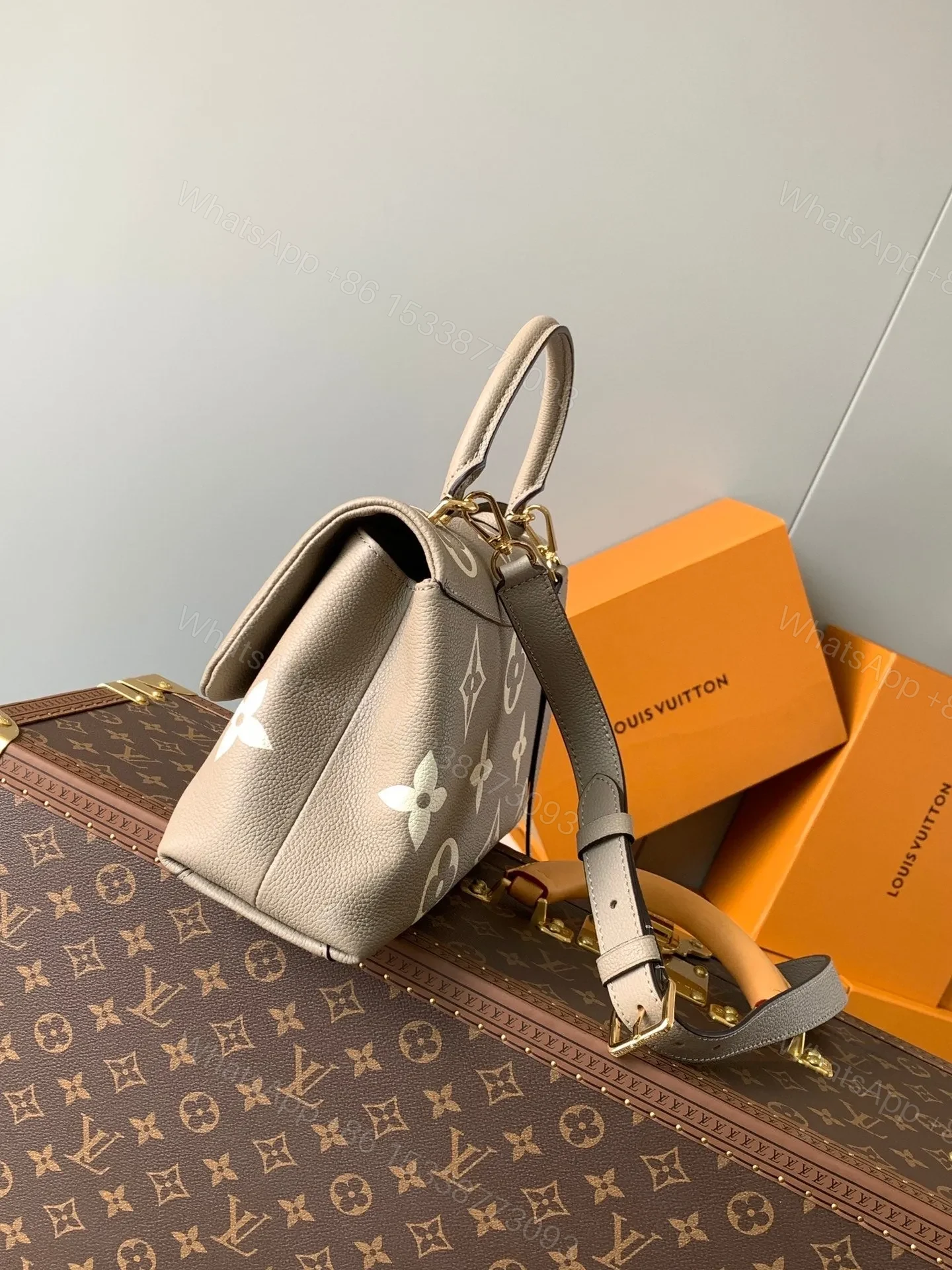 View 4 of LV MADELEINE 30 IN BEIGE MONOGRAM CALFSKIN EMBOSSED LOGO