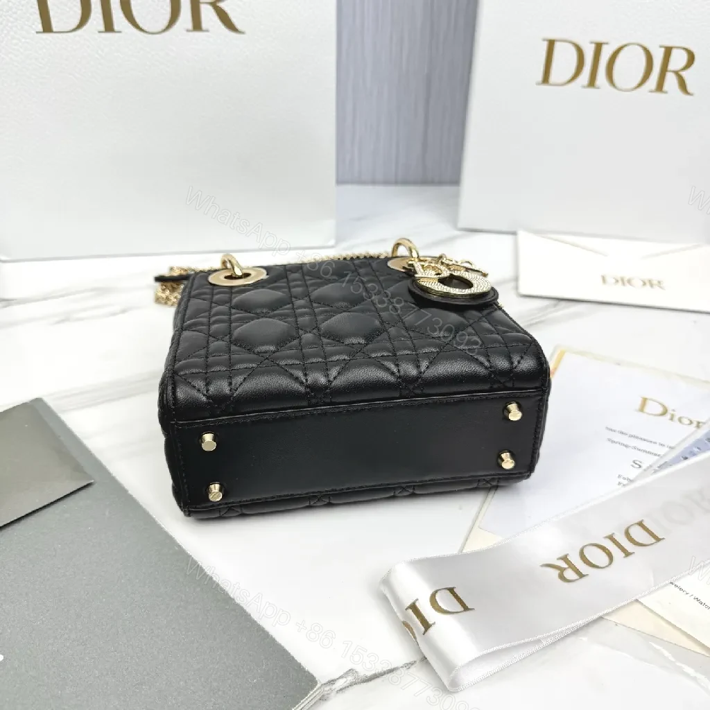 View 4 of Small Black Quilted Mini Bag with Gold Hardware - Elegant Compact Crossbody