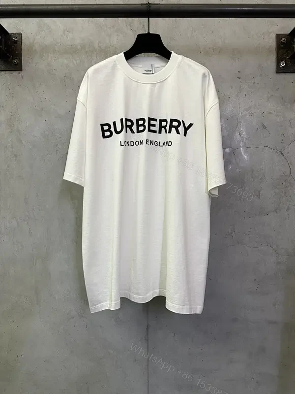 Bold Logo Tee: Minimalist Comfort, Black Graphic White Tee — view 1