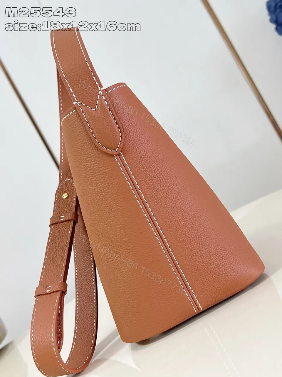 View 4 of Caramel Leather Bucket Bag - Structured, Minimal Hardware, Everyday Luxury