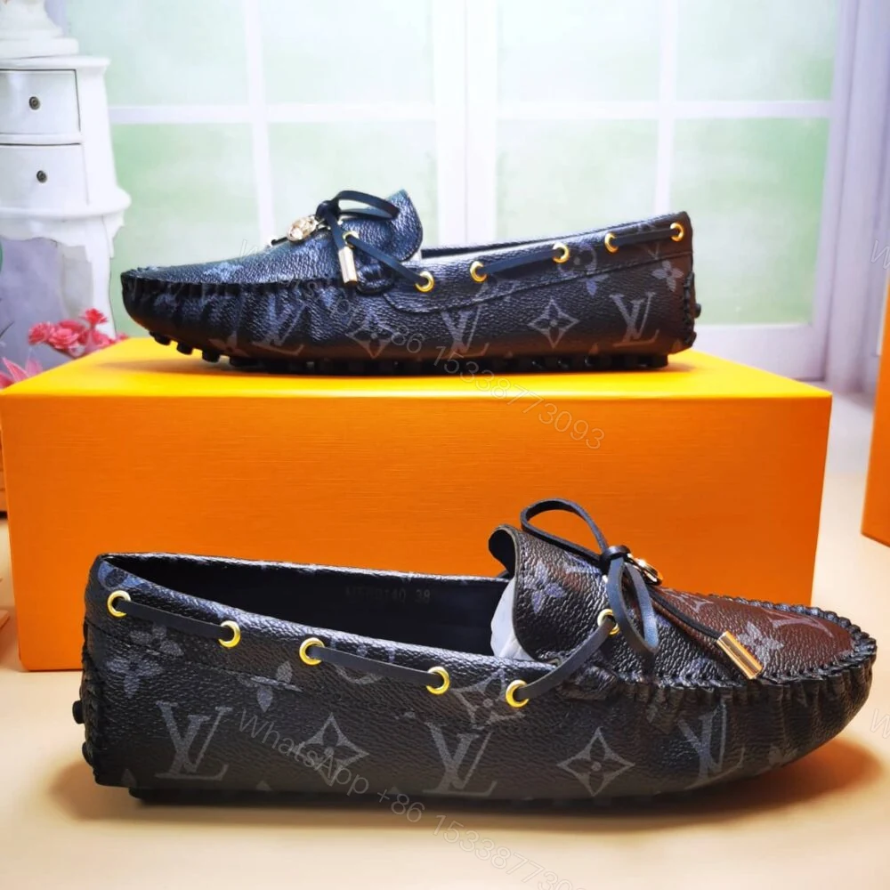 View 2 of Louis Vuitton Gloria Loafers Monogram Black