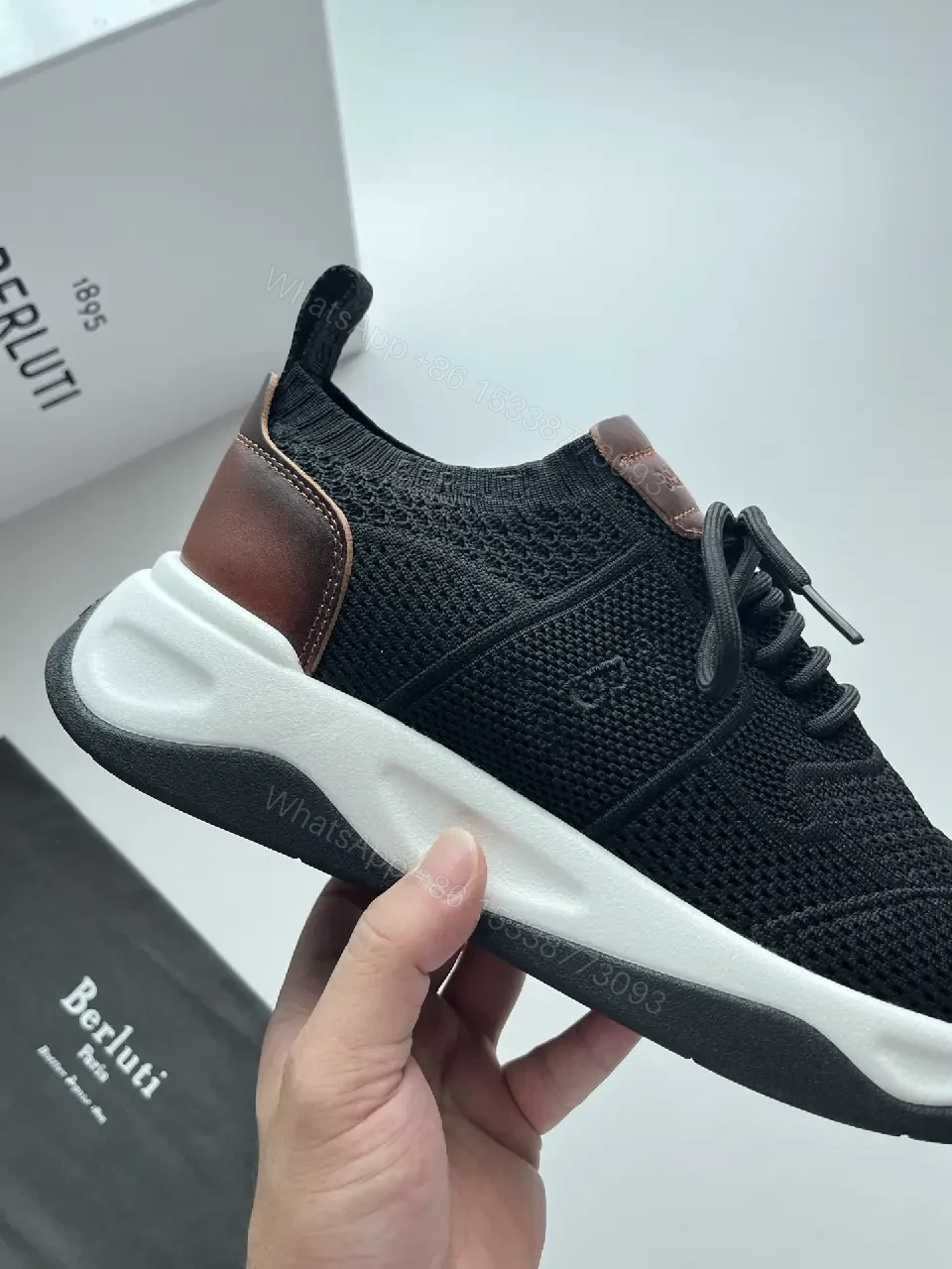 View 5 of Black knit sneakers with leather trim for everyday luxury and comfort