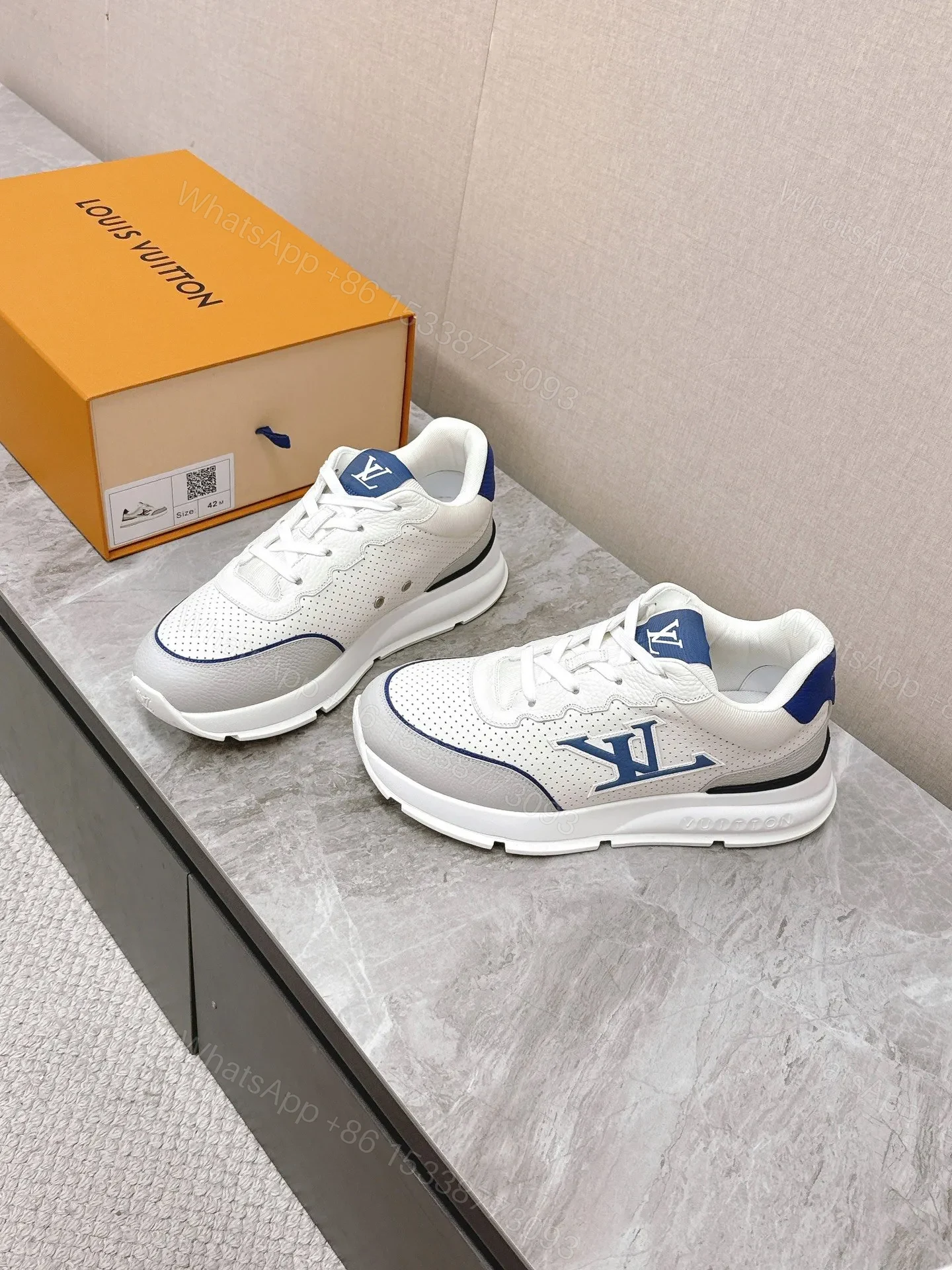 View 3 of LV Women White Leather Sneakers With Blue Accents