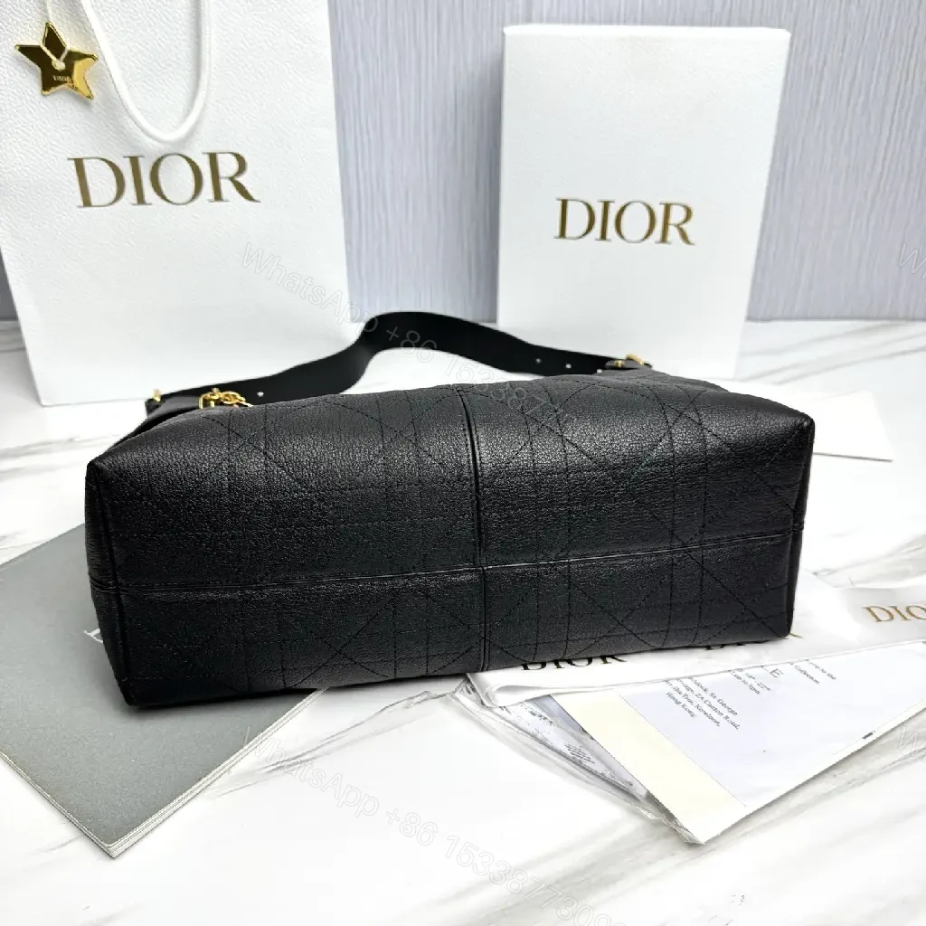 View 2 of Chic Black Leather Hobo with Gold Accents — Luxury Everyday Bag