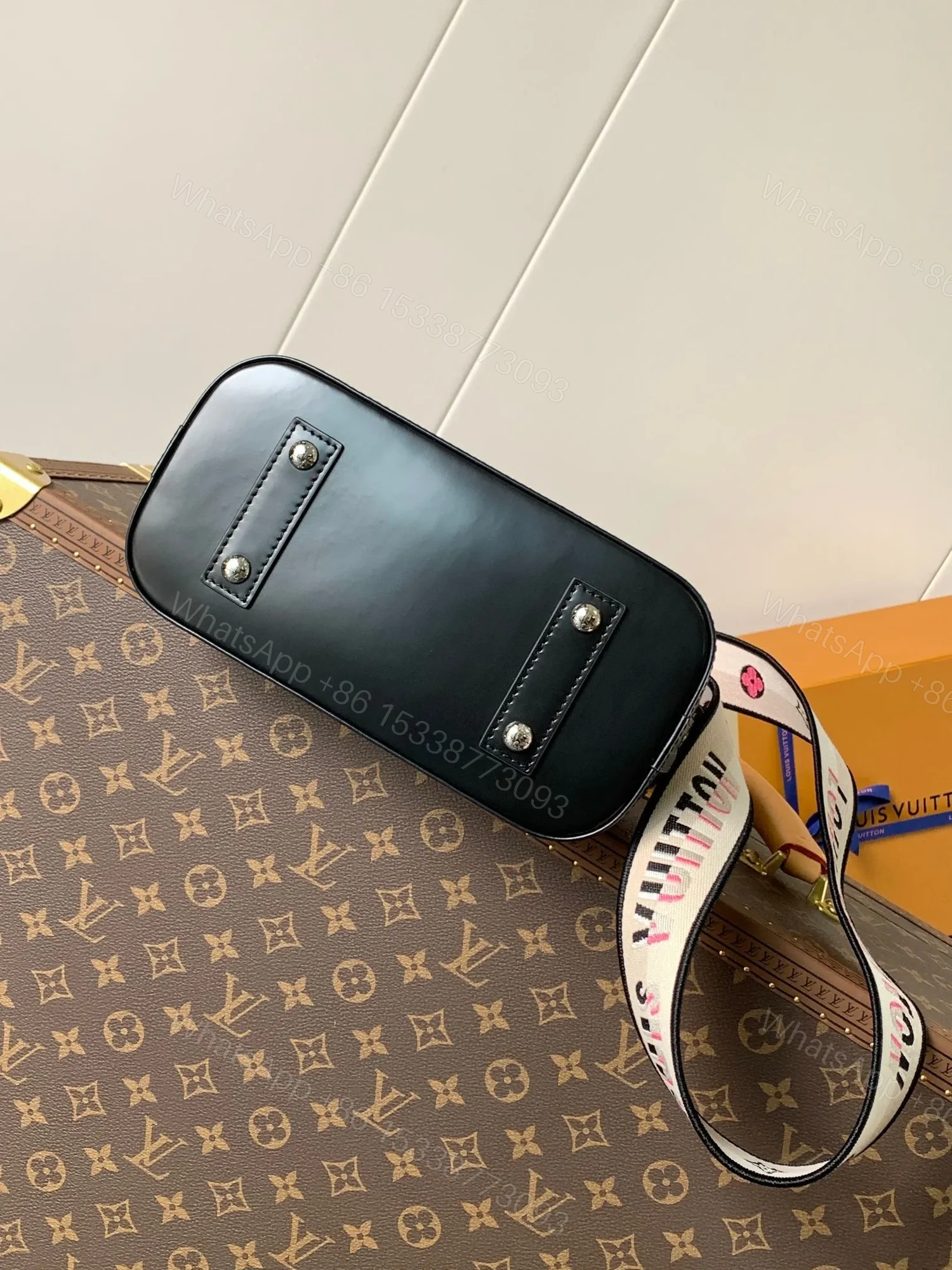 View 8 of LV ALMA BB BAG 23 IN BLACK GRAIN COWHIDE