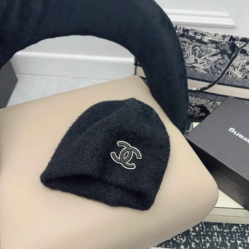 View 7 of Ivory Plush Handwarmer: Luxe Logo-Embossed, Lightweight Warmth