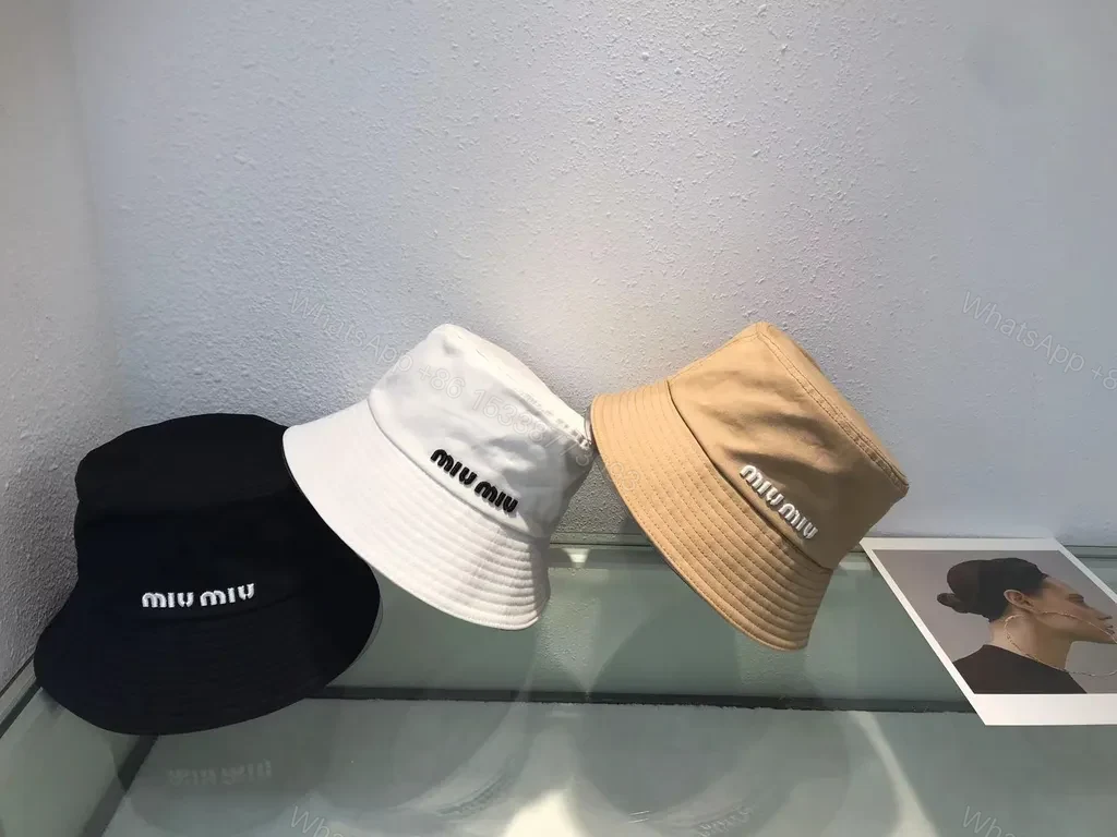 View 5 of Crisp White Miu Miu Bucket Hat: Iconic Logo Shield