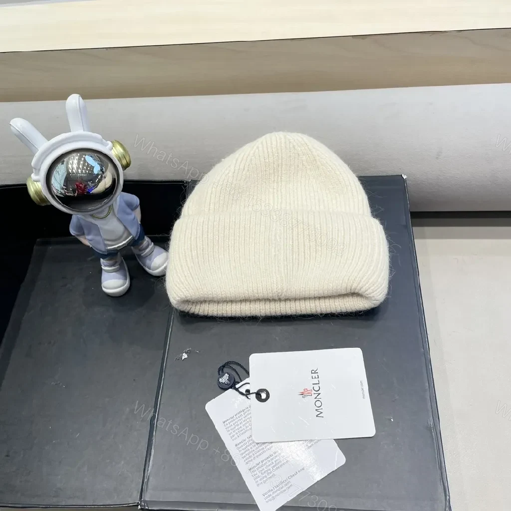 View 9 of Cozy Crest Beanie in Ivory Knit with Subtle Logo Patch