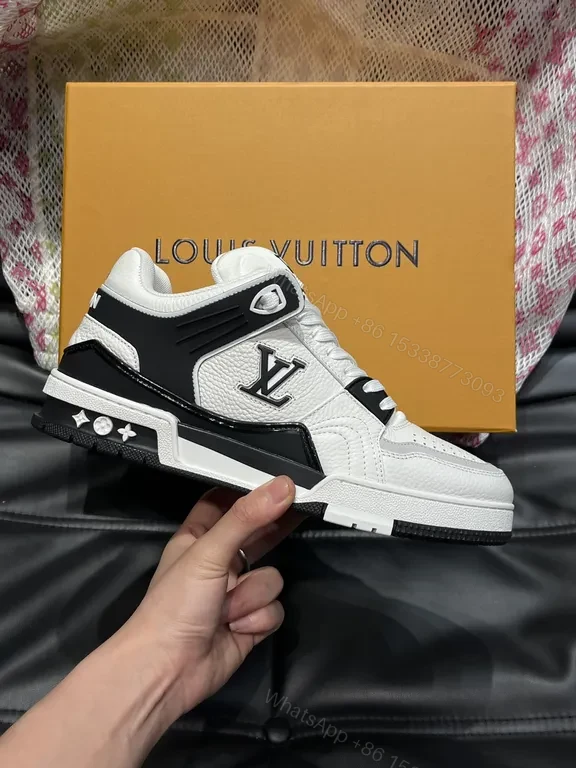 View 8 of White Leather High-Top Sneakers with LV Branding and Visible Hardware