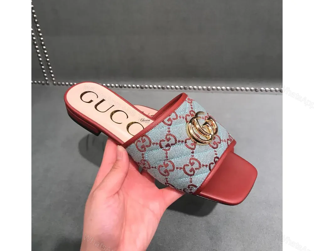 View 2 of Gucci GG Matelassé canvas flat sandals