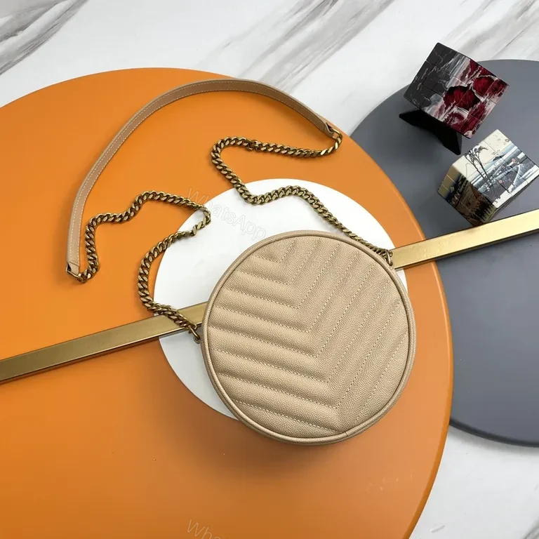 View 7 of Quilted Circular Crossbody Bag with Gold-YSL Emblem