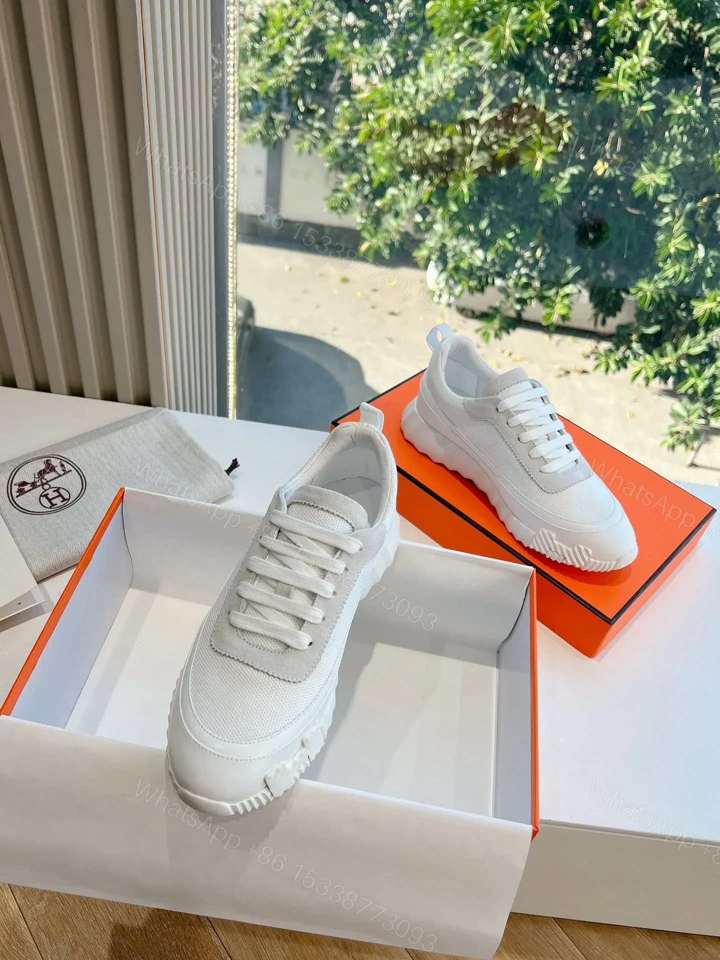 View 4 of Hermes Women White Mesh And Leather Sneakers