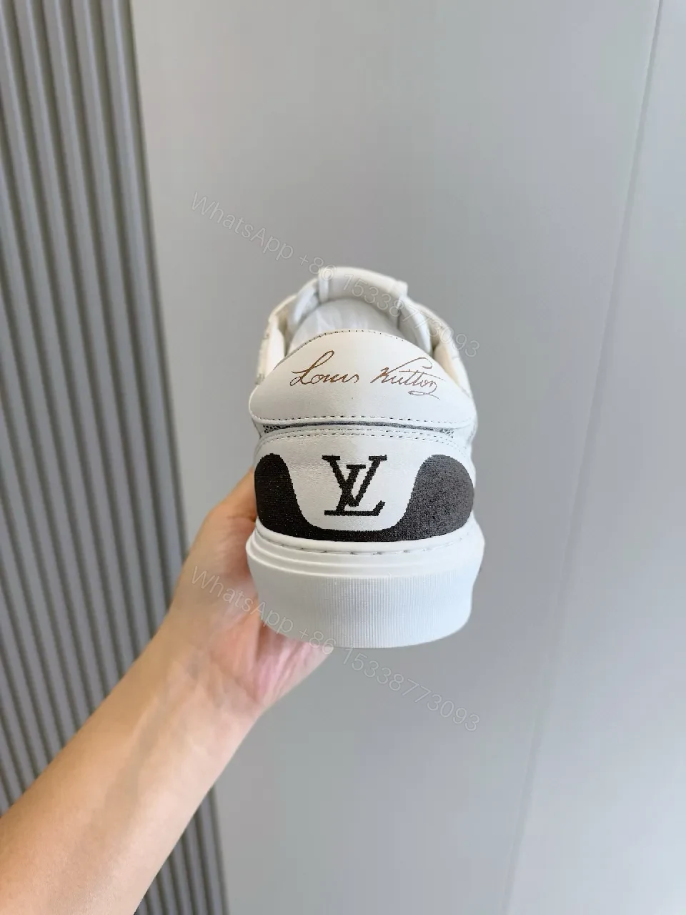 View 4 of Monochrome Checkerboard Sneakers with Signature LV Touch