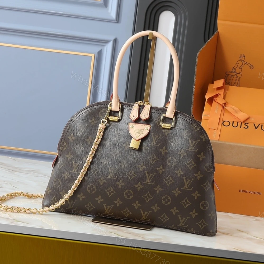 View 2 of Louis Vuitton Moon Alma Bag Monogram Brown 38Cm