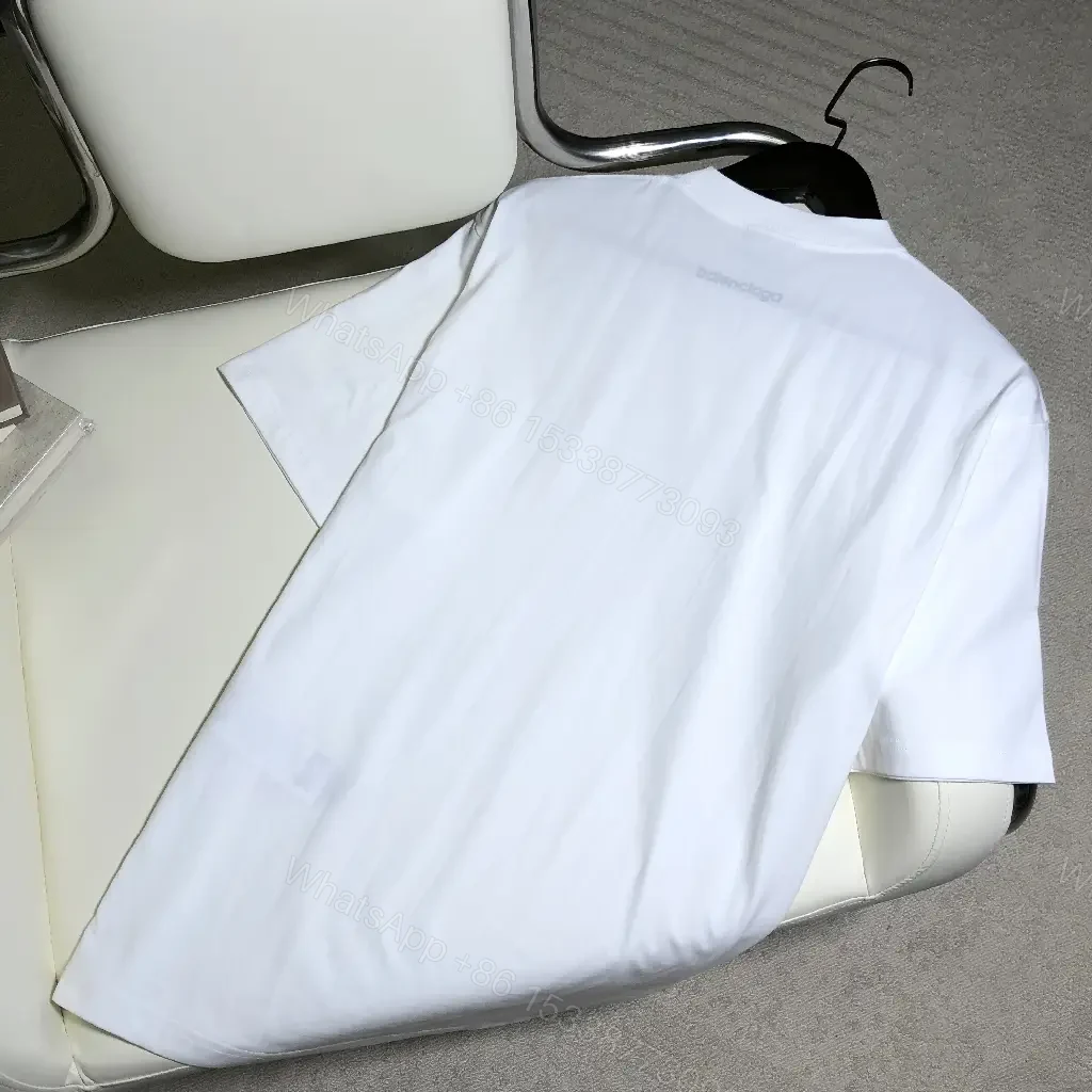 View 2 of white cotton oversized tee with logo motif premium everyday luxury