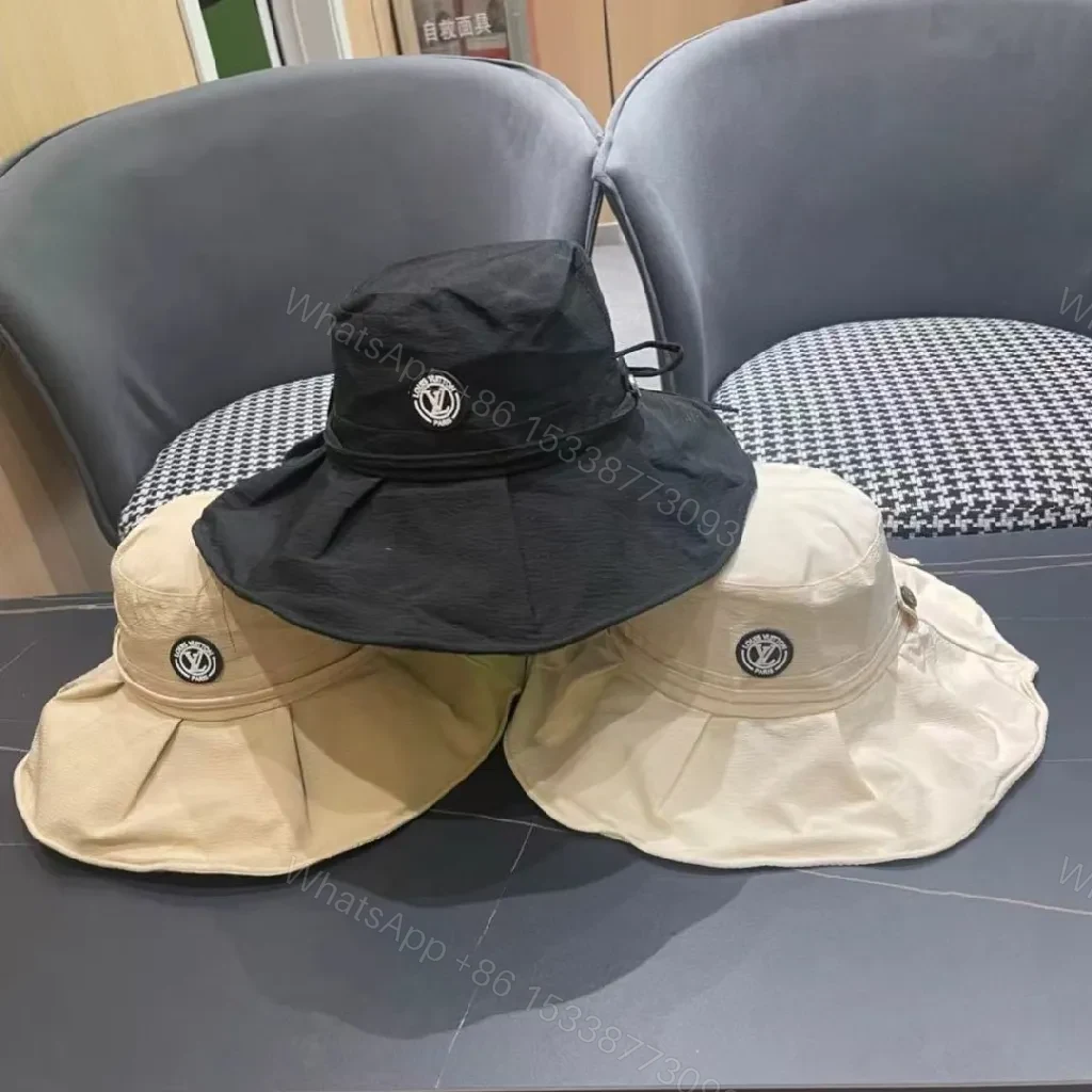 View 11 of Beige Textured Bucket Hat with Emblem, Everyday Luxury