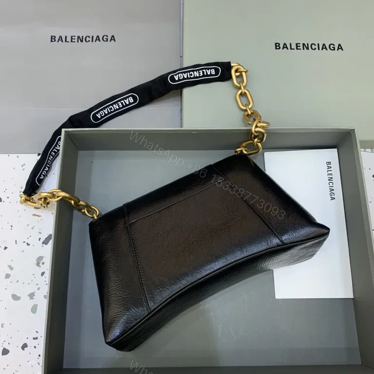 View 6 of Chic Black Leather Crossbody with Bold Gold Hardware Bag