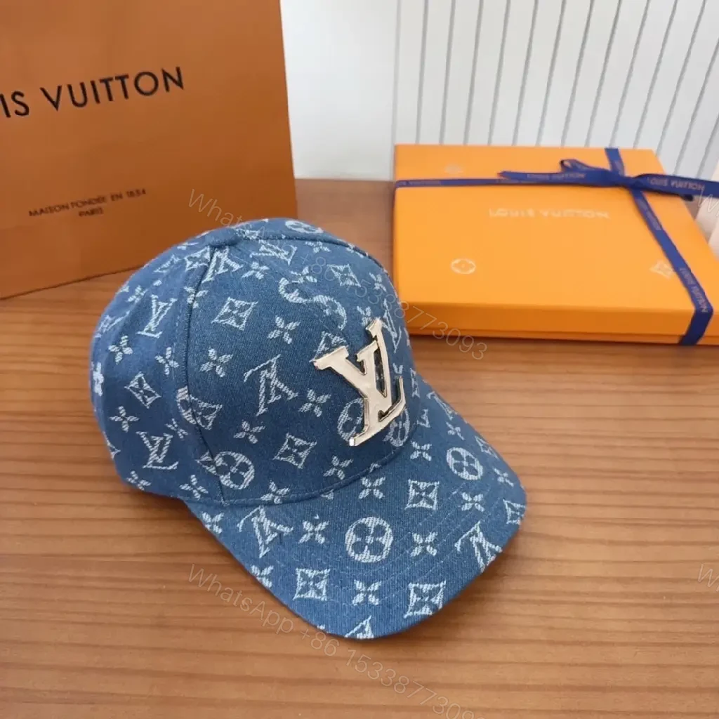View 3 of Indigo Denim Cap with Gold LV Crest Monogram, Curved Visor