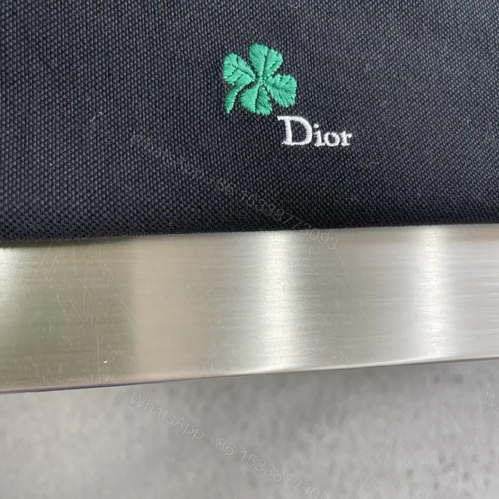 View 2 of Black Polo Tee with Green Clover – Subtle Luxe Everyday Polo