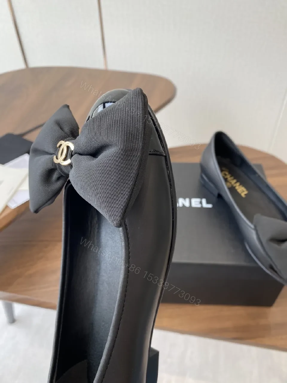 View 8 of Lux Black Leather Bow Flats with Gold Hardware