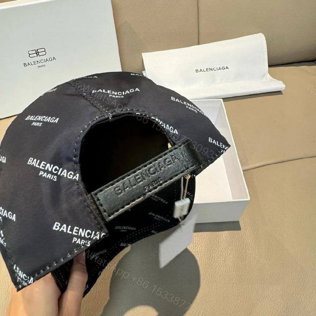 View 2 of Patterned Cap Navy Knit Cap, Subtle Luxury, All-Over Logo Print Cap