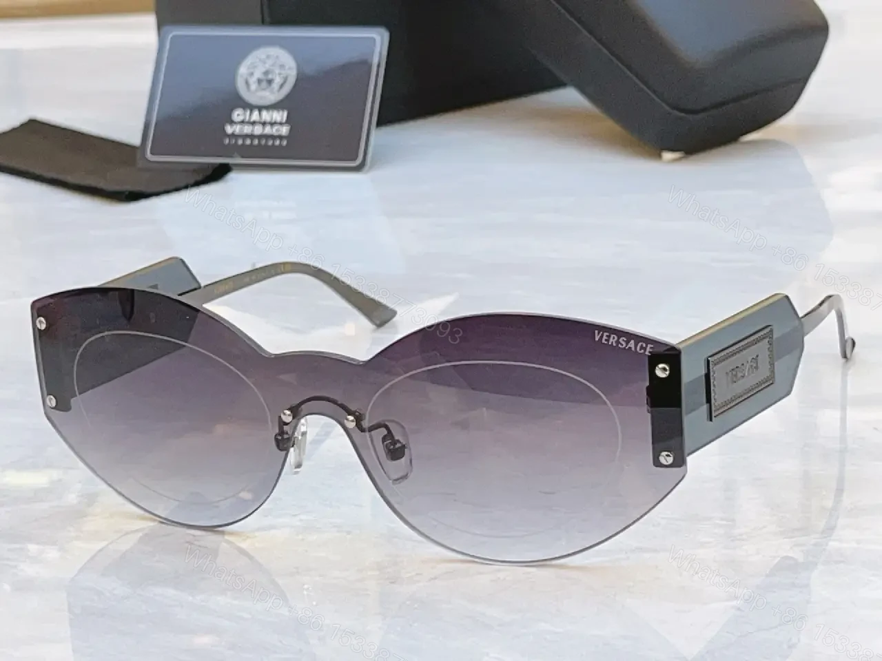 View 2 of Sculpted Round Sunglasses: Bold Hardware Luxe Eyewear