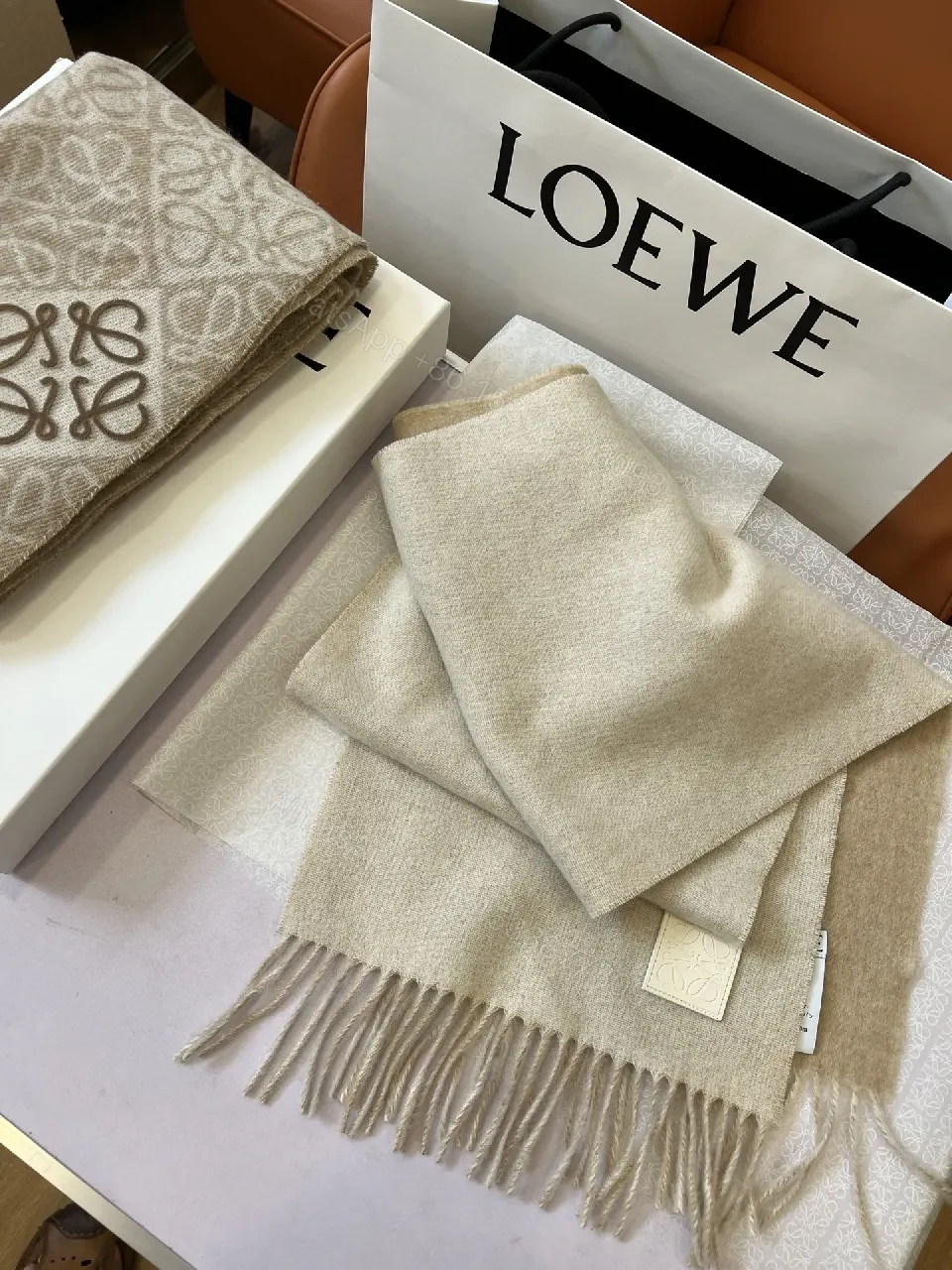 View 7 of Neutral Wool-Blend Scarf: Subtle Pattern, Elegant Fringe