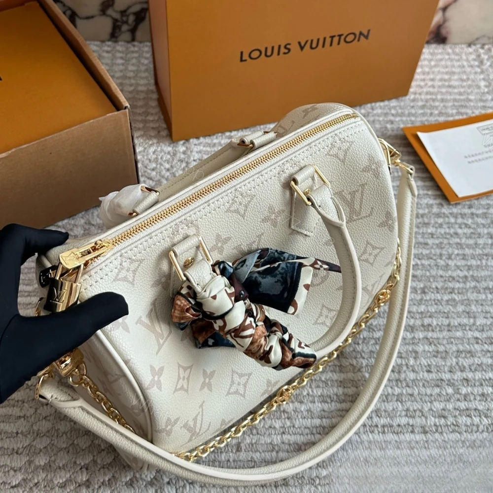 View 3 of Louis Vuitton Speedy Bandoulière 25 Cream 25Cm M26690