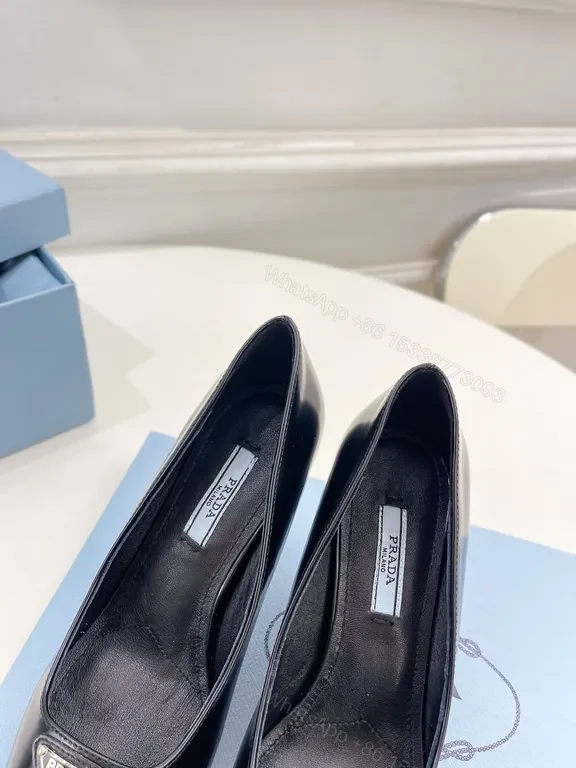 View 5 of Sleek Black Leather Pumps - Prada Hardware Chelsea-Style Pumps