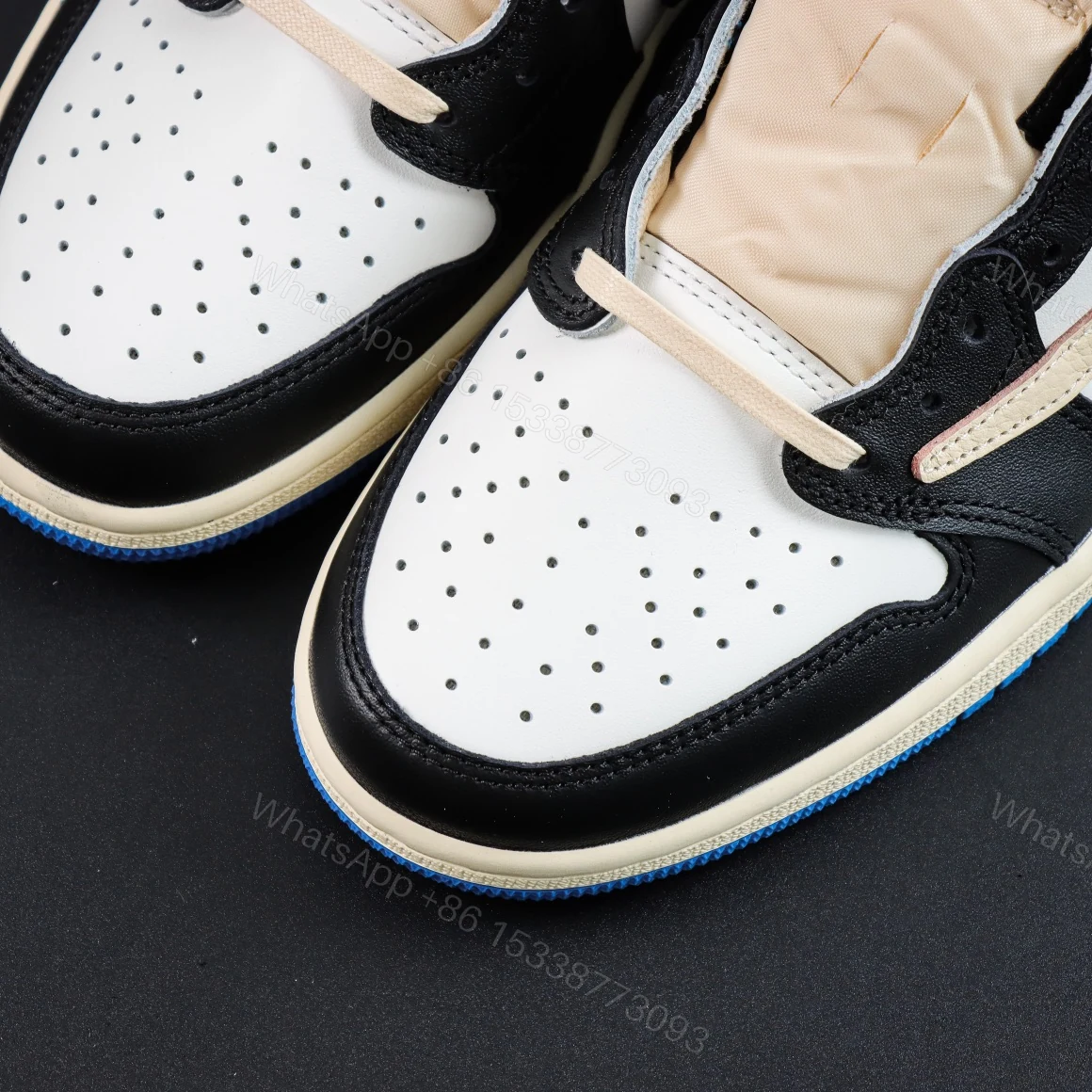 View 4 of Travis Scott Fragment Design Jordan 1 Reps Low​