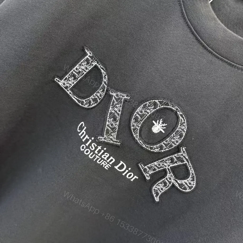 View 2 of Bold Luxe Monogram Tee: Black, Oversized Fit, Graphic Statement