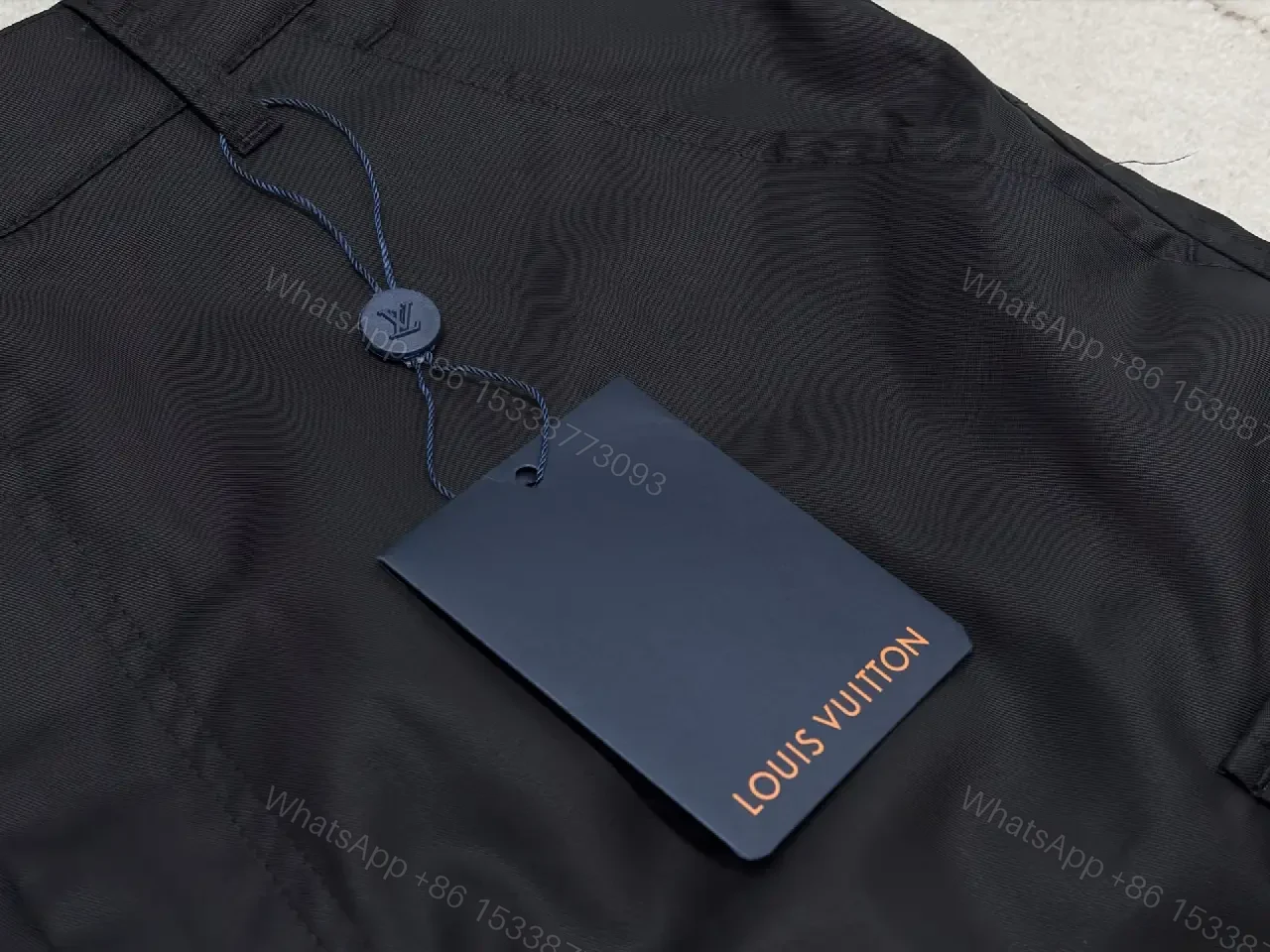 View 2 of Black Nylon Cargo Shorts Louis Vuitton Style Utility Pockets Shortage Key Feature